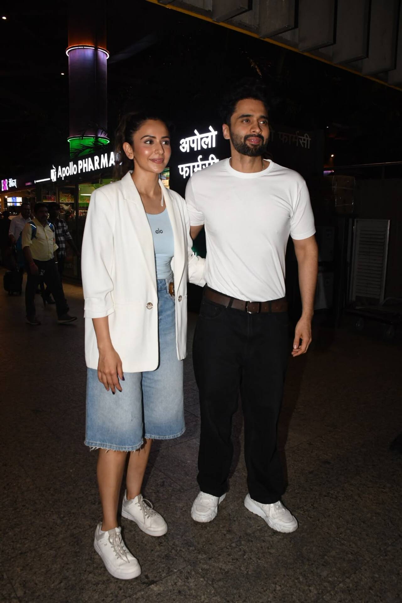 Rakul Preet Singh and husband Jackky Bhagnani were spotted at airport. Rakul kept it chic in a white blazer over a pastel blue top and denim shorts, paired with white sneakers, while Jackky opted for a classic white T-shirt, black trousers, and sneakers.